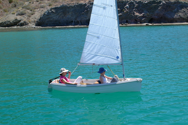 Sea Venture's sailing dinghy. Mama and I tooling around one of the lovely coves in the Sea of Cortez.